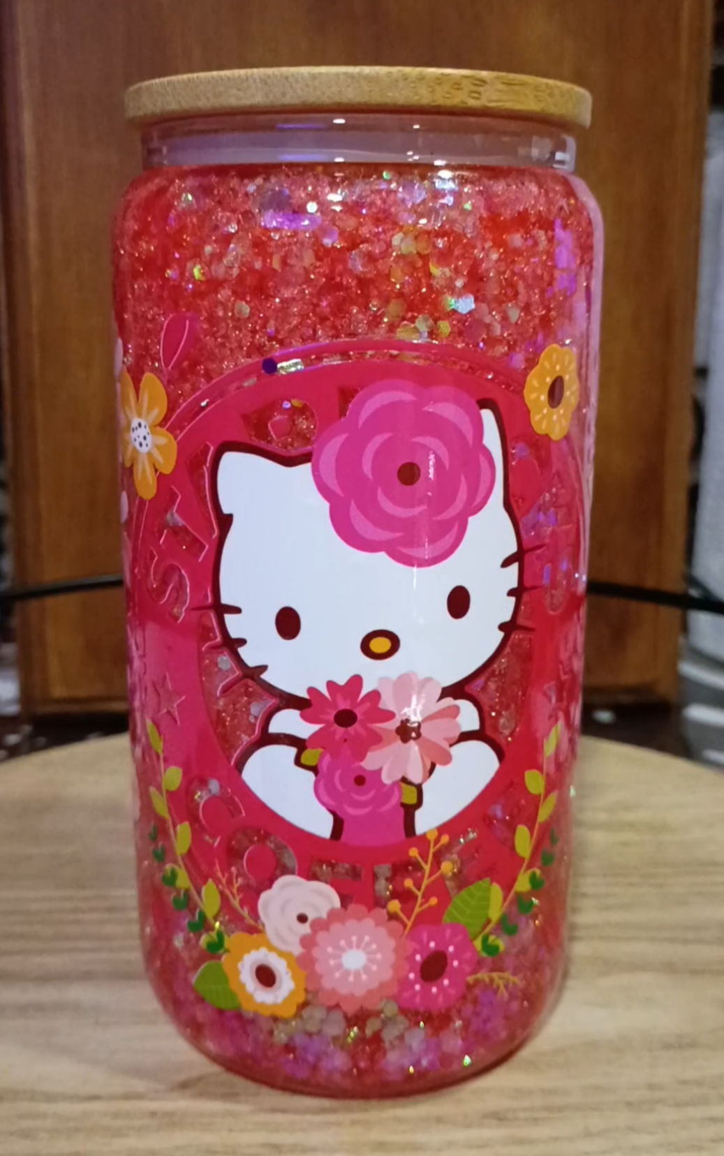 Custom Hello Kitty Glitter Snow Globe Tumbler with red glitter and bamboo lid