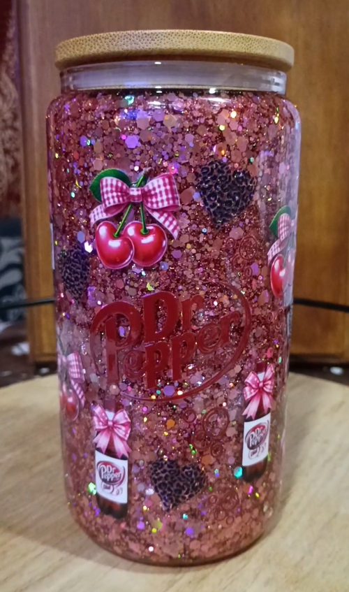 Custom Dr Pepper Glitter Snow Globe Tumbler with pink glitter, cherries, and bamboo lid